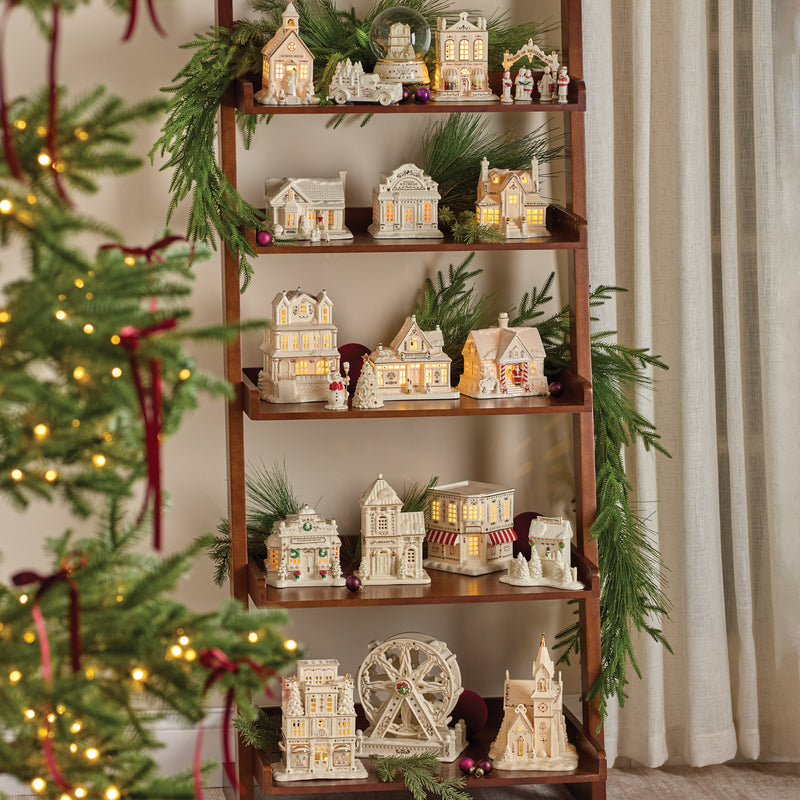 Elegant Ceramic Village on Tiered Ladder Shelves — Christmas Village Display