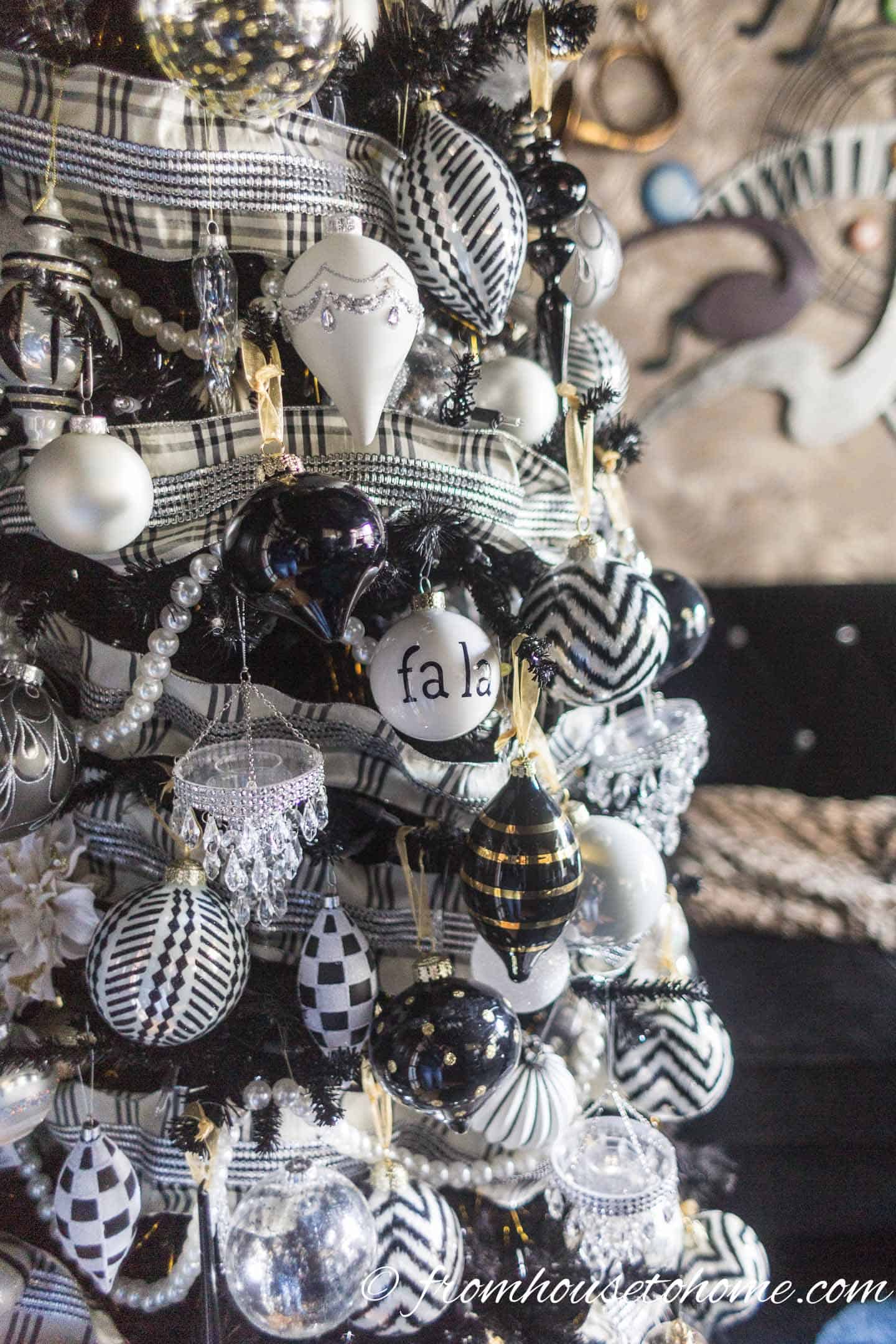 Black, White, and Gold Tree Decorations with Pearl Strands Black, White, and Gold Tree Decorations with Pearl Strands — Black and Gold Christmas Tree