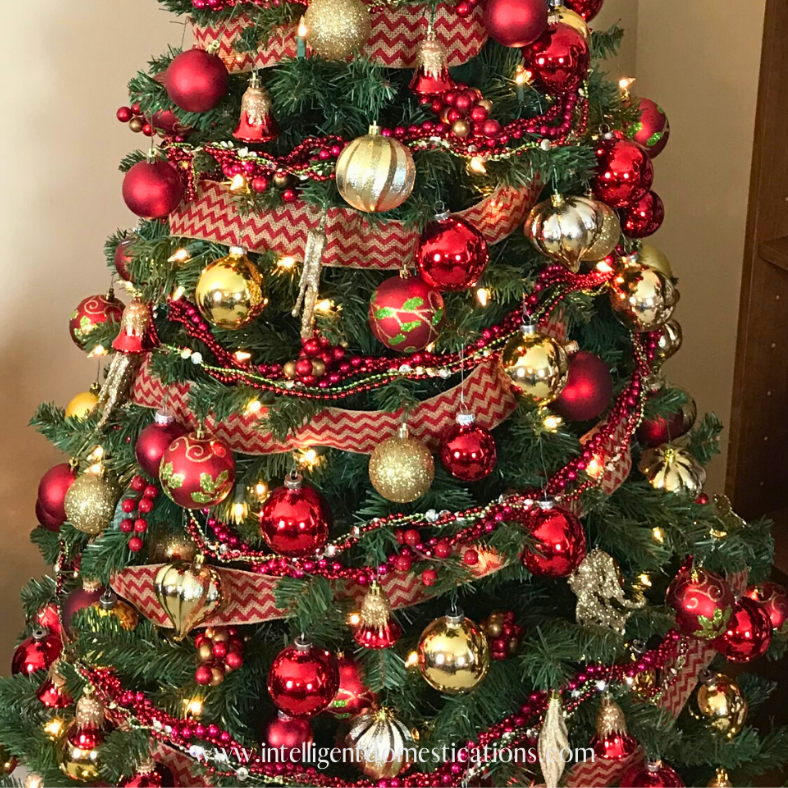Densely Decorated Christmas Tree with Red and Gold Garlands Densely Decorated Christmas Tree with Red and Gold Garlands — Red and Gold Christmas Decor