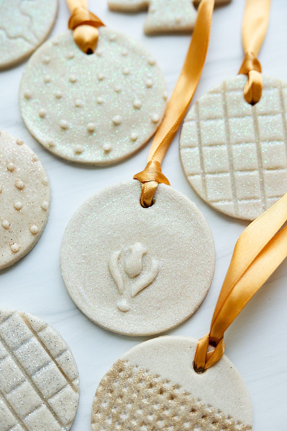 Glittered Circular Ornaments with Gold Ribbons Glittered Circular Ornaments with Gold Ribbons — Salt Dough Ornaments