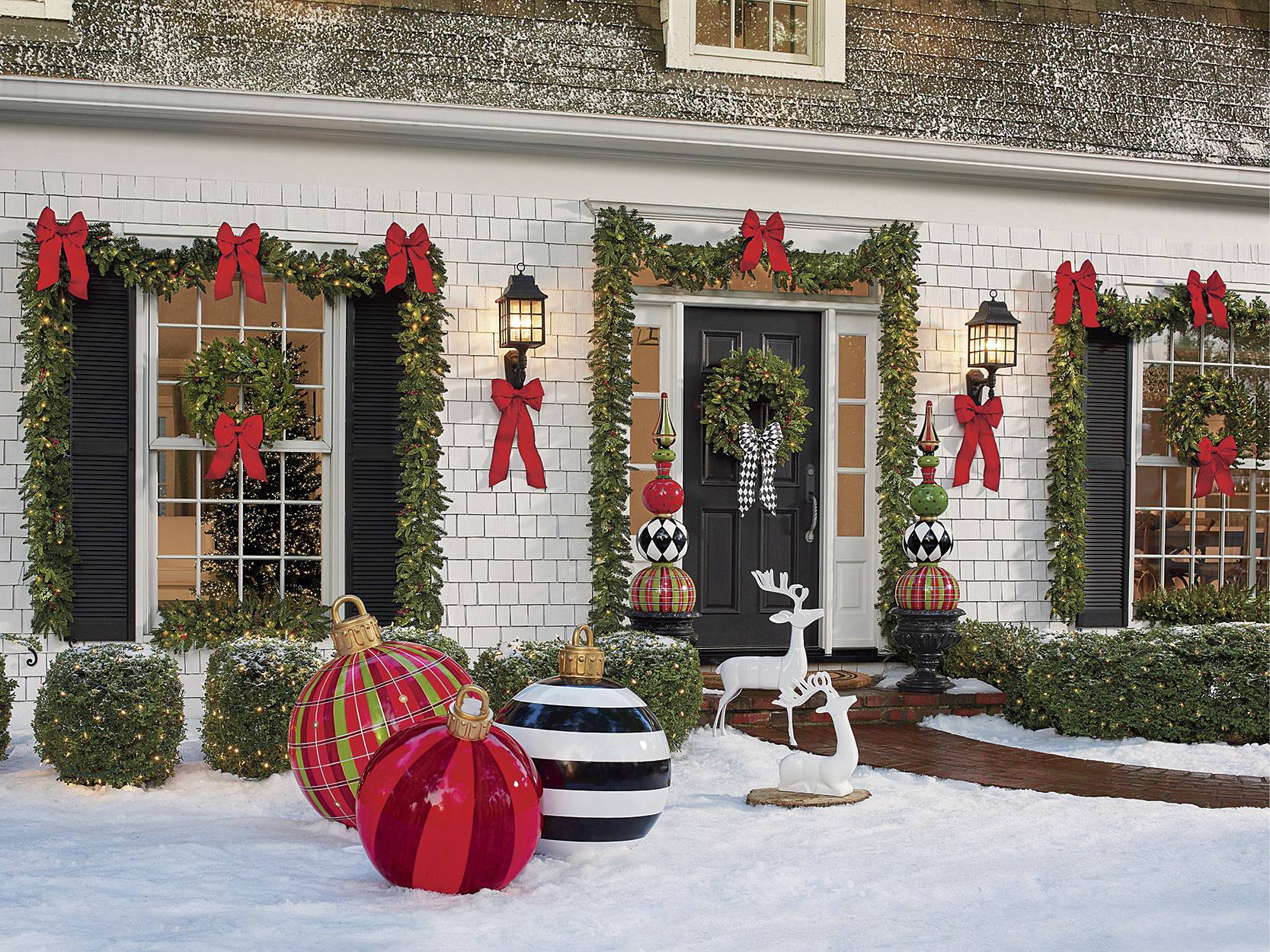 Festive Exterior with Oversized Red Bows and Deer Festive Exterior with Oversized Red Bows and Deer — Traditional Christmas Decor