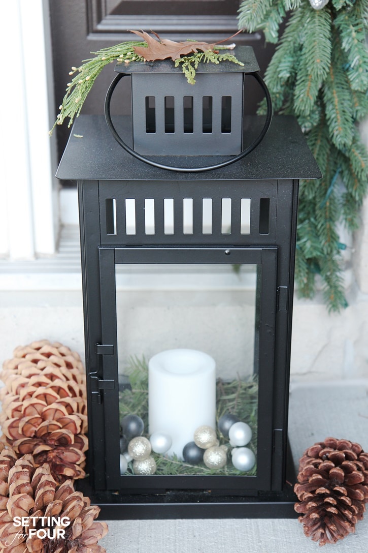Minimalist Black Lantern with Pine Sprigs and Pinecones — Christmas Porch Lanterns