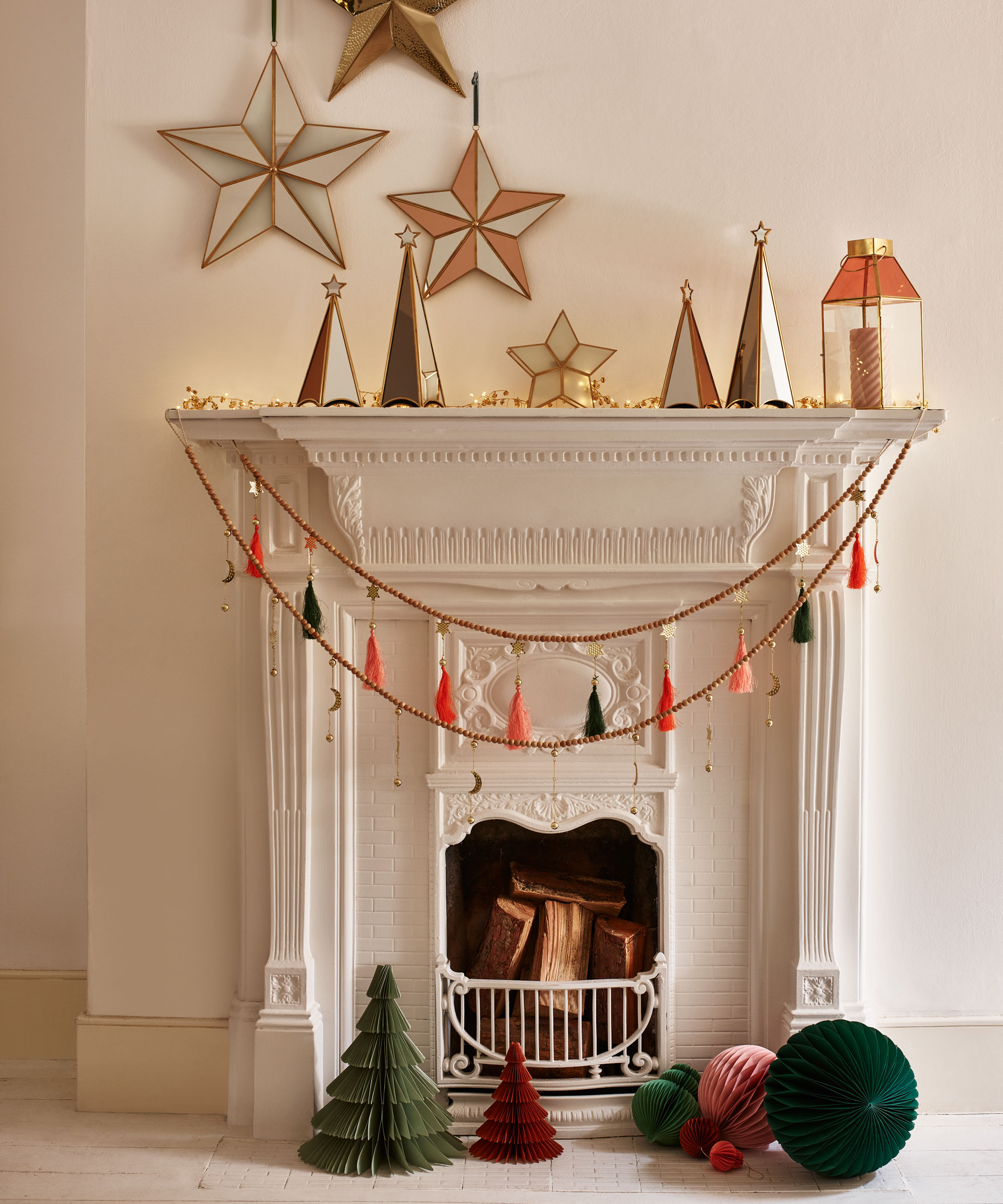 Modern Mantel with Geometric Trees and Metallic Stars Modern Mantel with Geometric Trees and Metallic Stars — Christmas Fireplace Decor