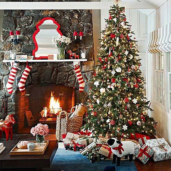 Stone Fireplace with Christmas Tree and Hanging Stockings Stone Fireplace with Christmas Tree and Hanging Stockings — Traditional Christmas Decor