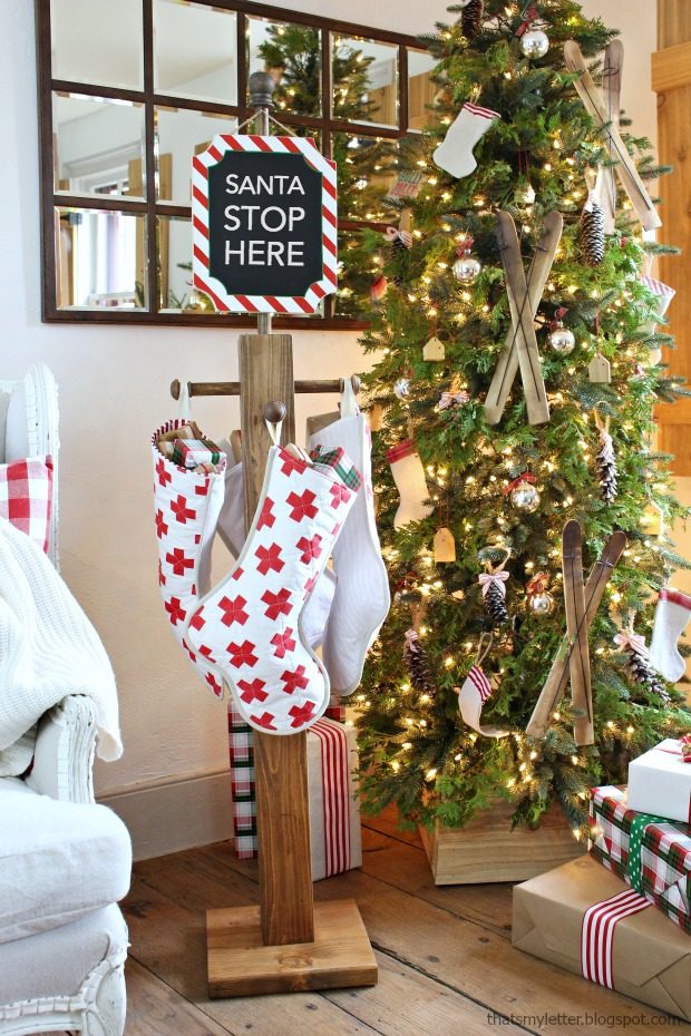 Freestanding Wooden Holder with Patterned Stockings — Christmas Stockings Display