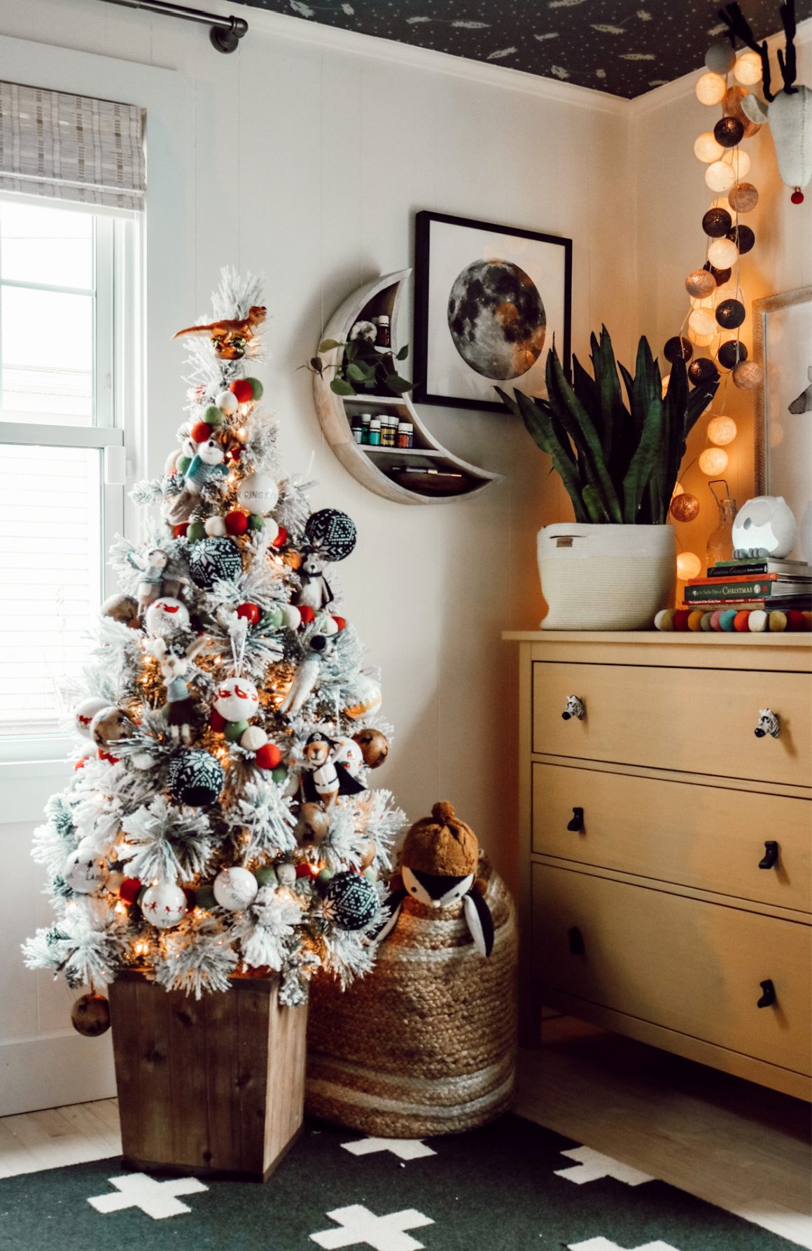 Flocked Christmas Tree with Eclectic Ornaments in Boho Corner — Kids Bedroom Christmas Decor