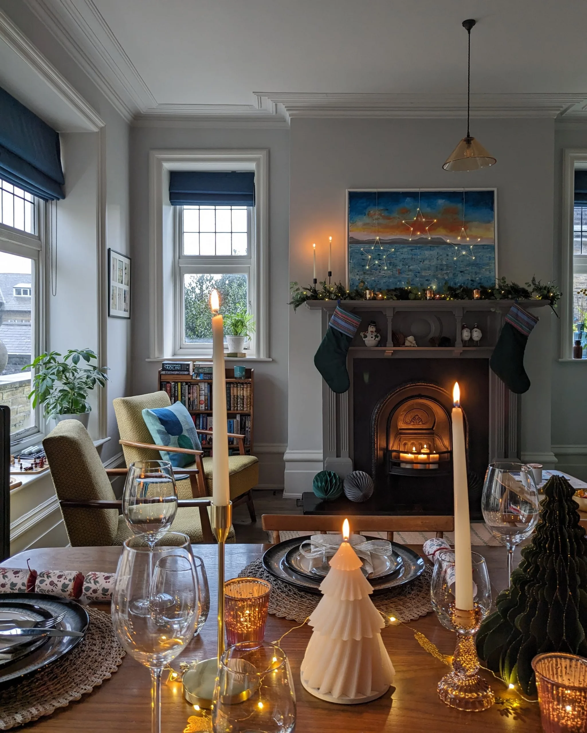 Eclectic Dining Room with Fireplace and Table Candles — Christmas Dining Room Decor