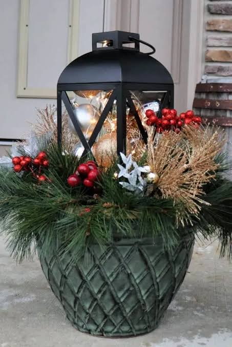 Modern Black Lantern Integrated into a Festive Planter Display — Christmas Porch Lanterns