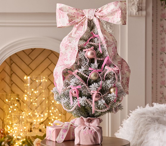 Miniature Christmas Tree with Pink Bow and Pearl Ornaments Miniature Christmas Tree with Pink Bow and Pearl Ornaments — Ornament Christmas Tree
