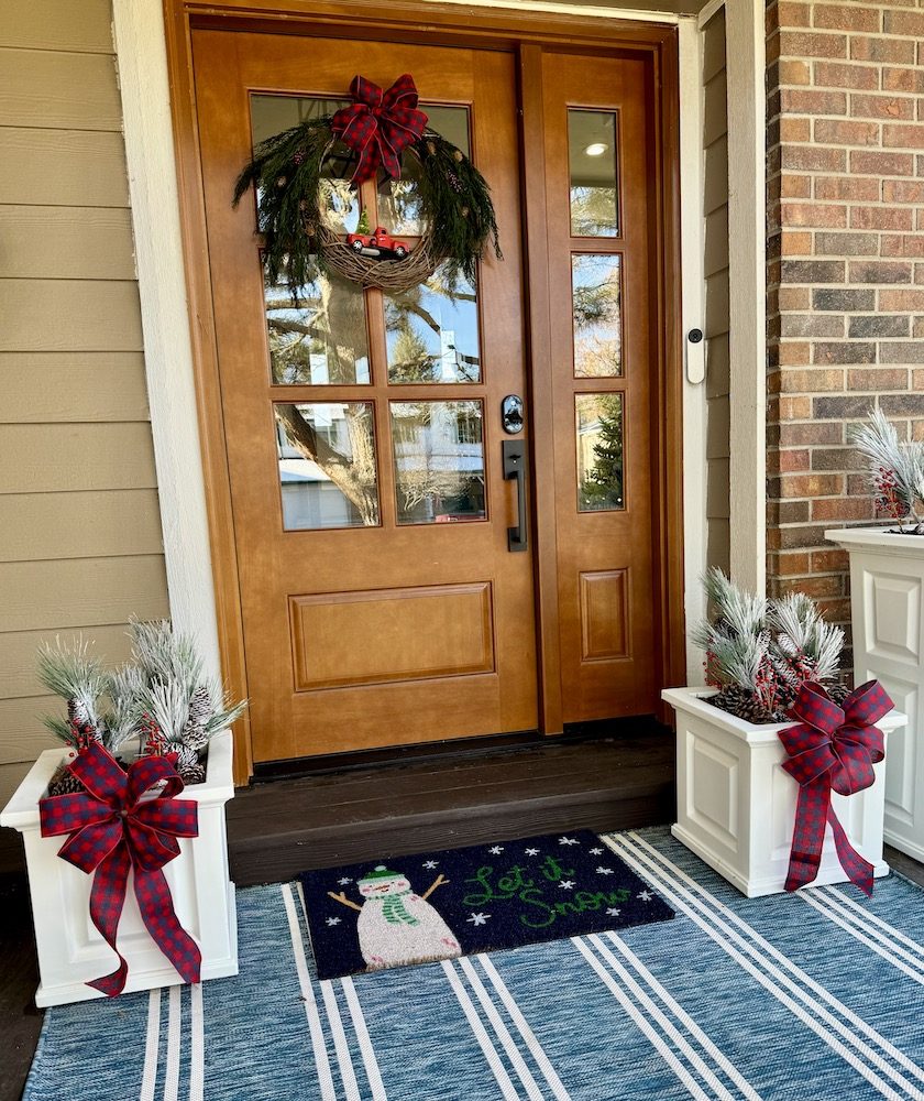 Festive Front Door with Wreath and Snowman Doormat Festive Front Door with Wreath and Snowman Doormat — Small Christmas Porch