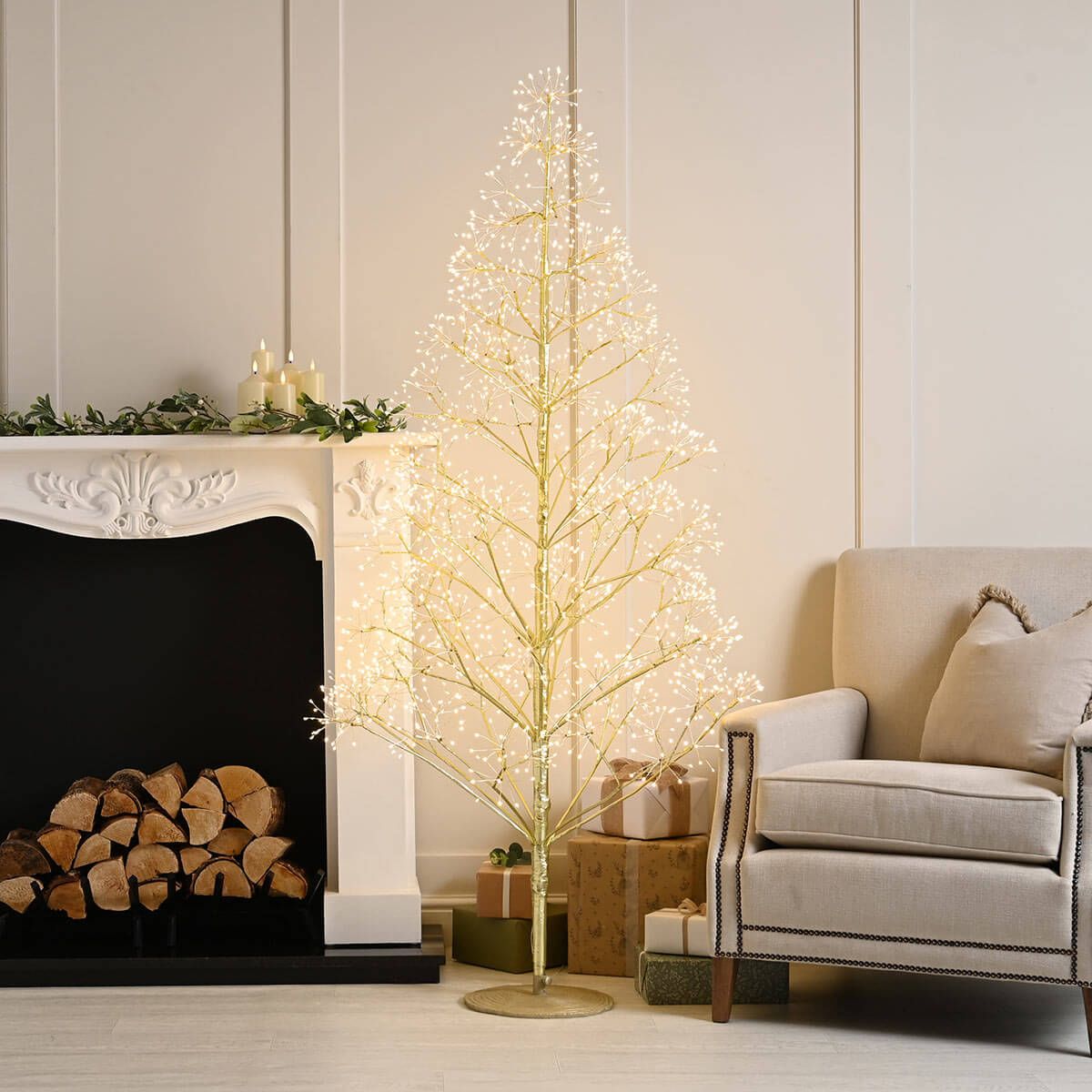 Pre-lit Christmas tree with a gold base for a cozy holiday evening Pre-lit Christmas tree with a gold base for a cozy holiday evening — Gold and White Christmas Tree
