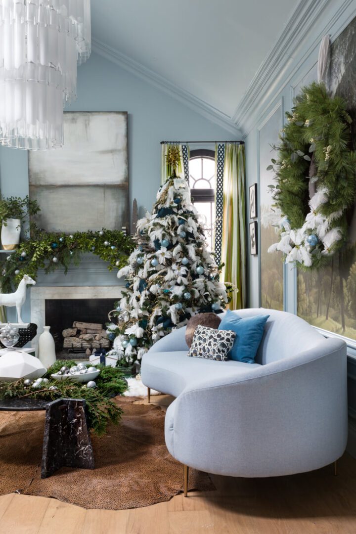 Modern Blue and White Flocked Tree with Feather Accents — Christmas Tree Decorating