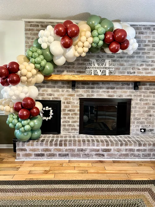 Farmhouse Style Balloon Garland Over a Brick Fireplace — Christmas Balloon Garland