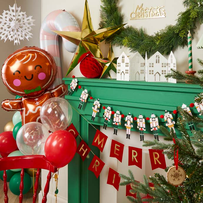 Whimsical Gingerbread Man Balloon and Nutcracker Mantel Display Whimsical Gingerbread Man Balloon and Nutcracker Mantel Display — Christmas Party Backdrop