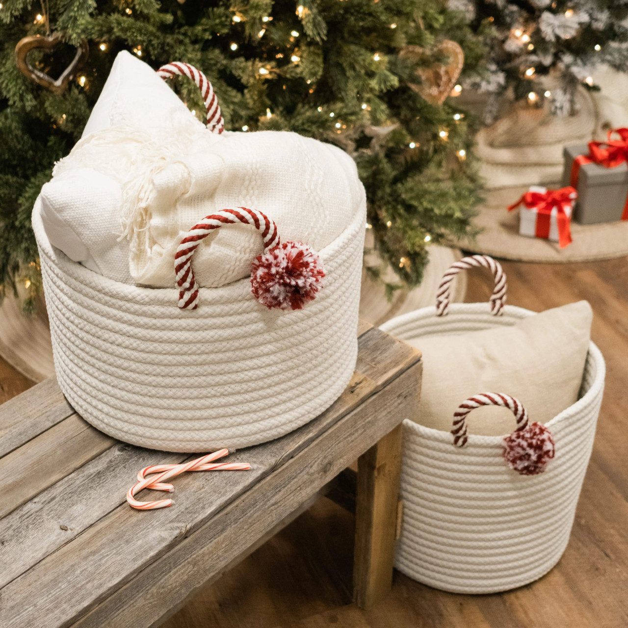 Rattan Baskets with Candy Cane Handles and Red Pom-Poms — Candy Cane Christmas Decor