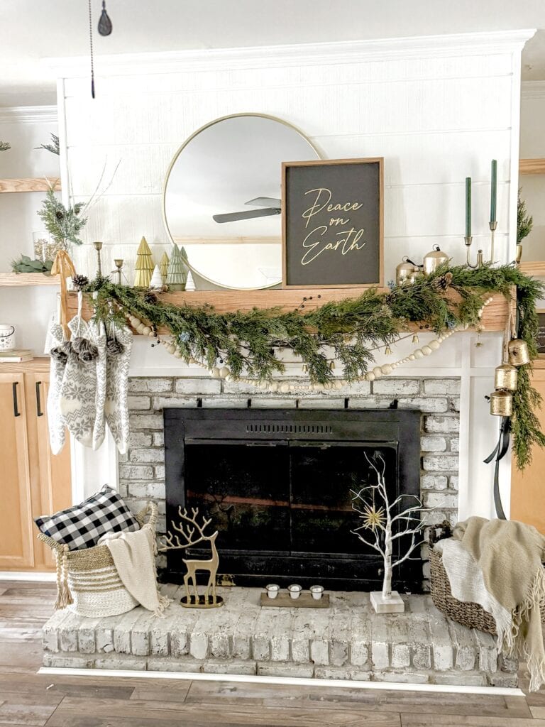 Modern Farmhouse Mantel with Lush Garland and Round Mirror — Christmas Mantel Decor