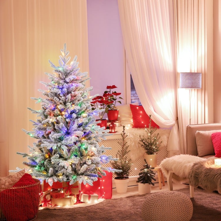 Group of Flocked Christmas Trees with Multi-Color Lights — Flocked Christmas Tree Decor