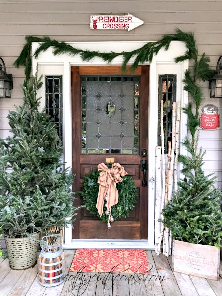 Symmetrical Arrangement Around The Door Farmhouse Porch Entrance with Festive Wreath and Flanking Trees — Farmhouse Christmas