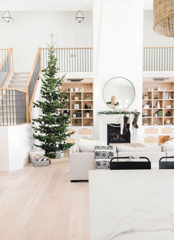 Central Tree in Open-Plan Space with Light Wood Floors — Minimalist Christmas Tree