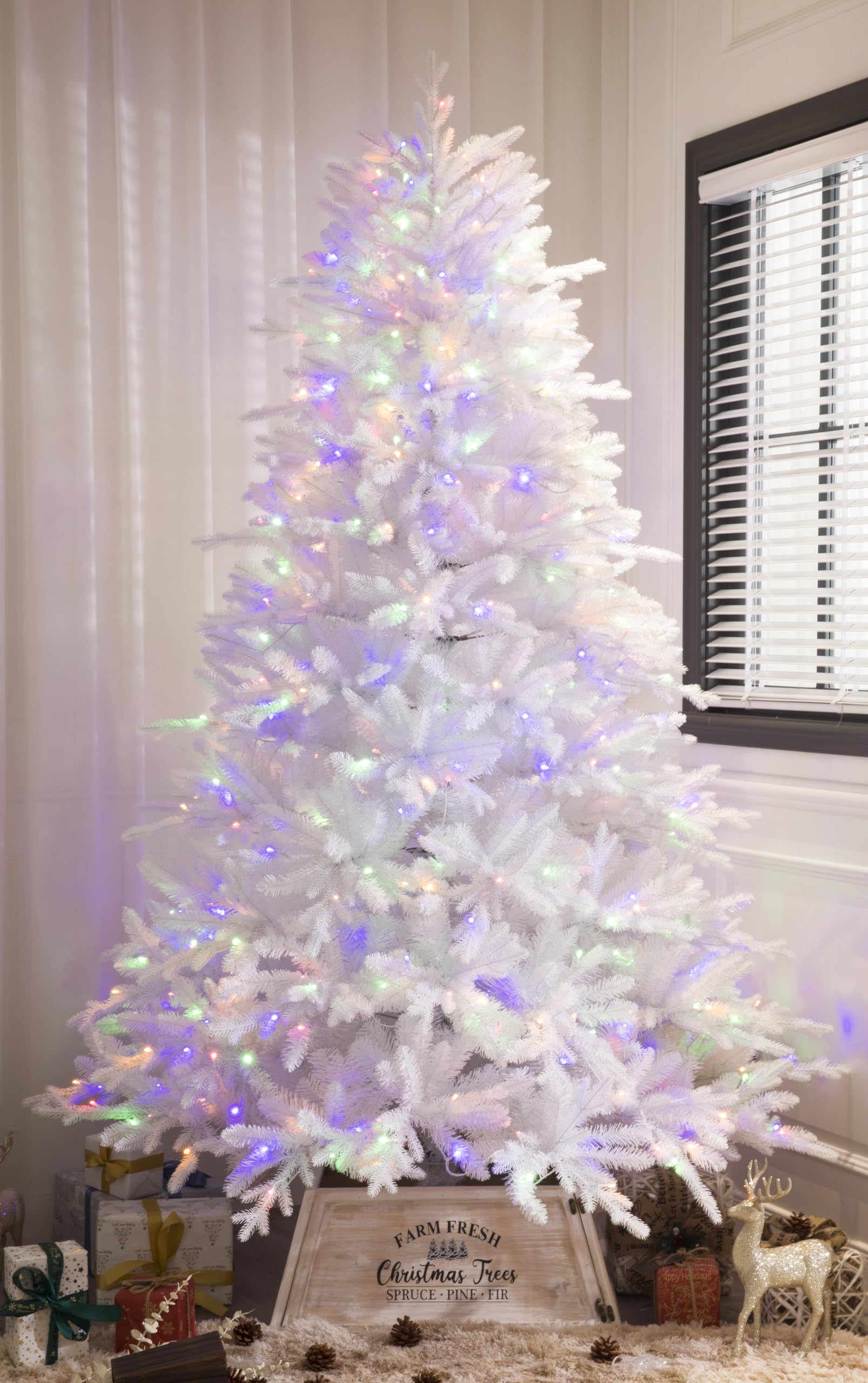 Modern White Christmas Tree Illuminated with Multicolor Lights Modern White Christmas Tree Illuminated with Multicolor Lights — White Christmas Decor