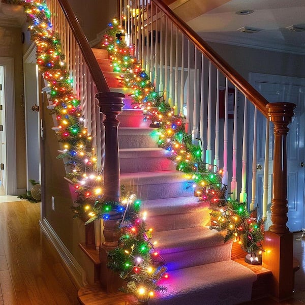 Festive Garland with Vibrant Multi-Coloured Lights on Staircase Festive Garland with Vibrant Multi-Coloured Lights on Staircase — Christmas Lights in Garland Indoor