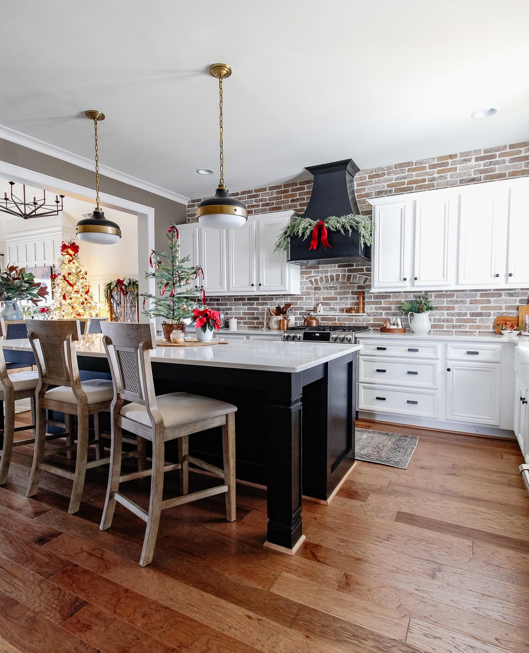 Farmhouse Kitchen Island and Black Range Hood with Garland — Farmhouse Christmas Kitchen