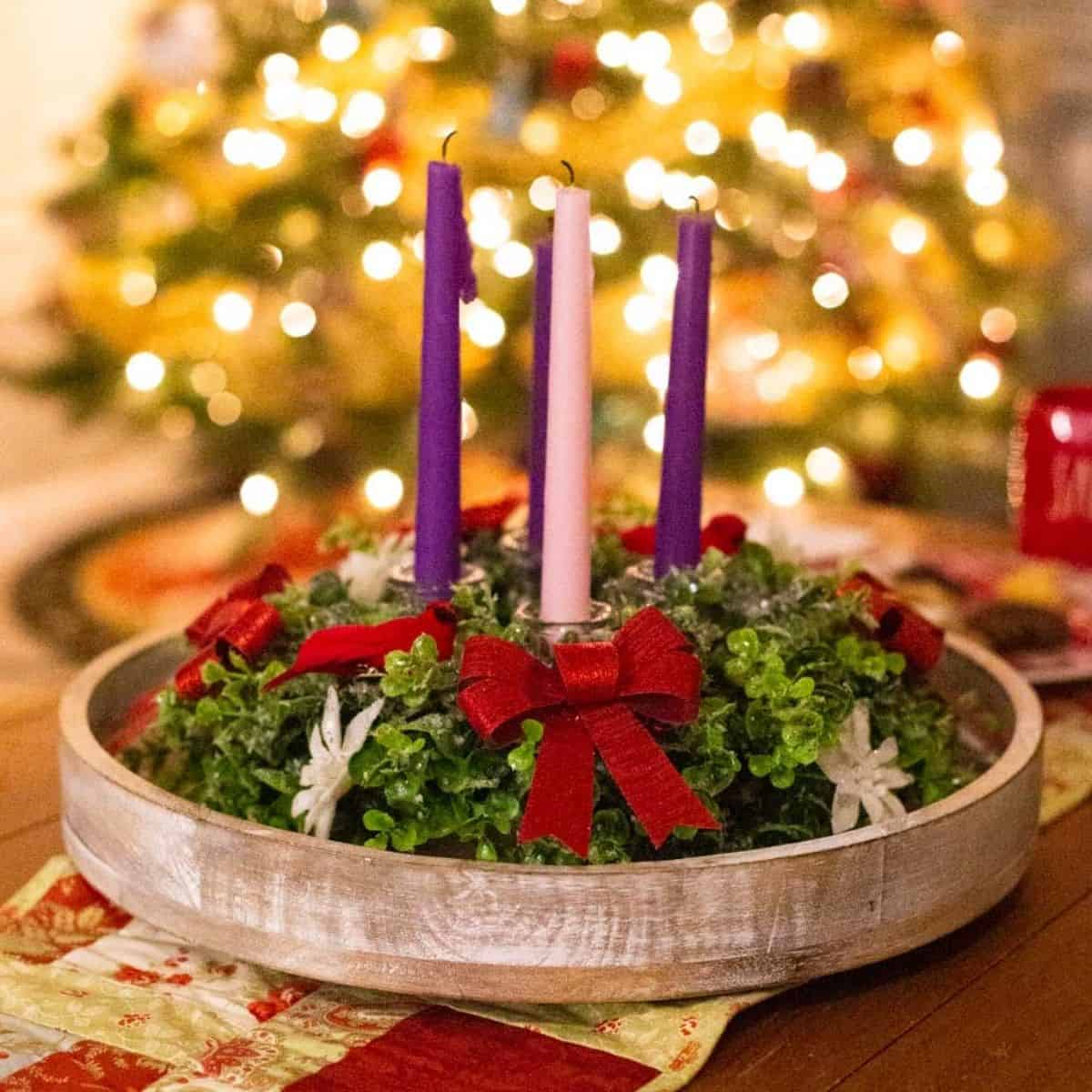 Festive Advent Wreath with Red Bow and Snowflake Accents Festive Advent Wreath with Red Bow and Snowflake Accents