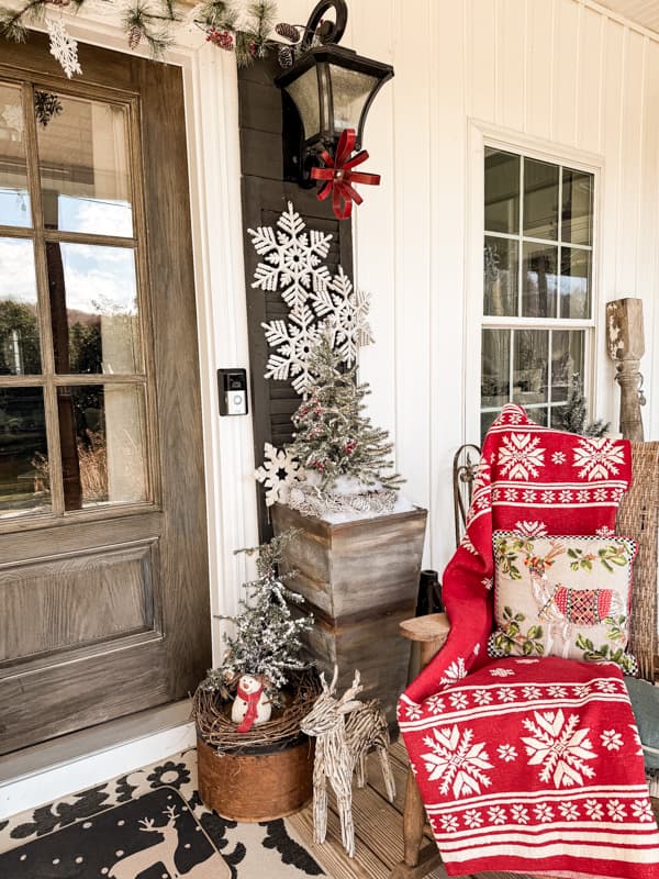 Cozy Country Porch with Snowman and Snowflake Throw — Winter Wonderland Christmas Decor