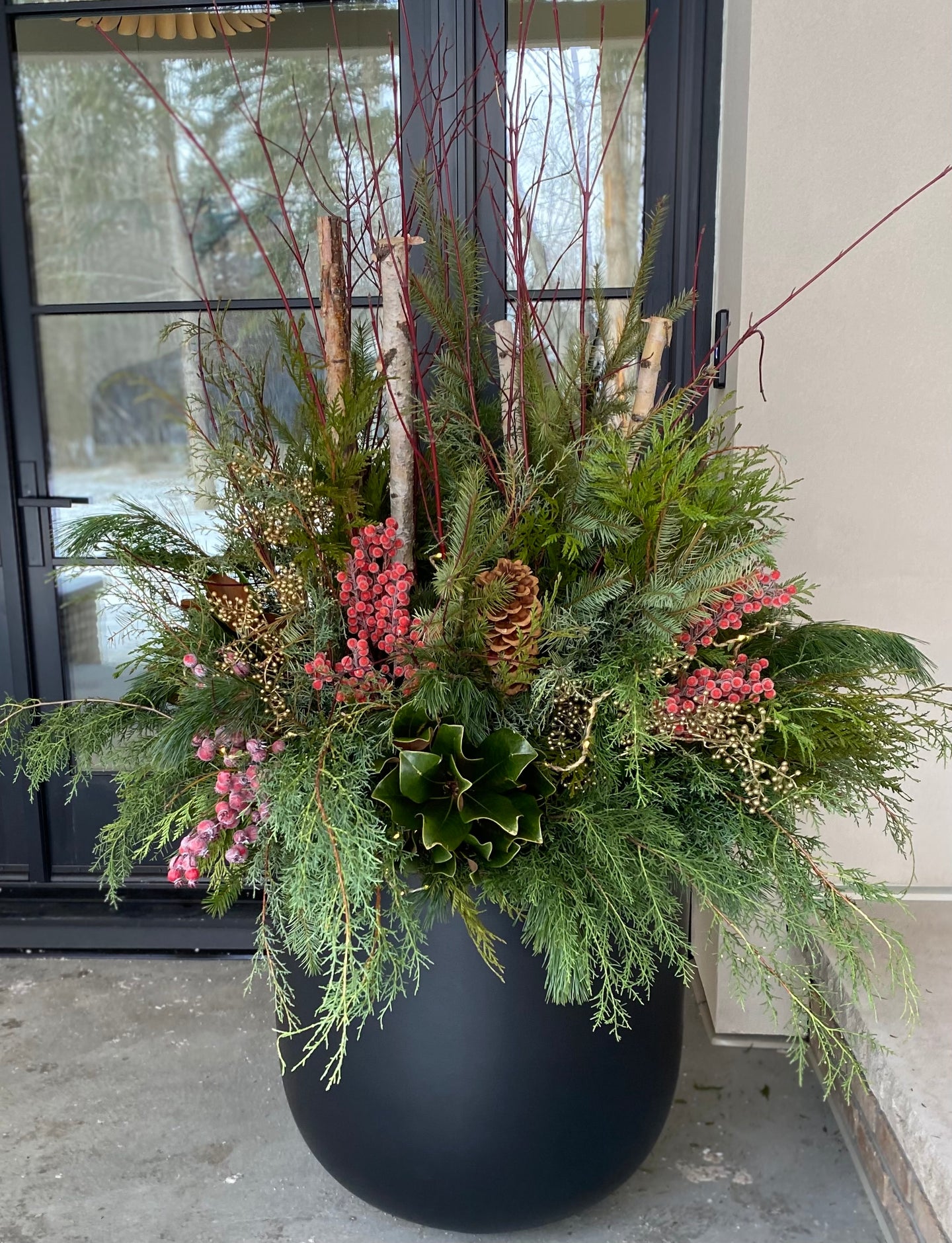 Black Planter with Birch Logs and Pink Berries Black Planter with Birch Logs and Pink Berries — Christmas Porch Planters