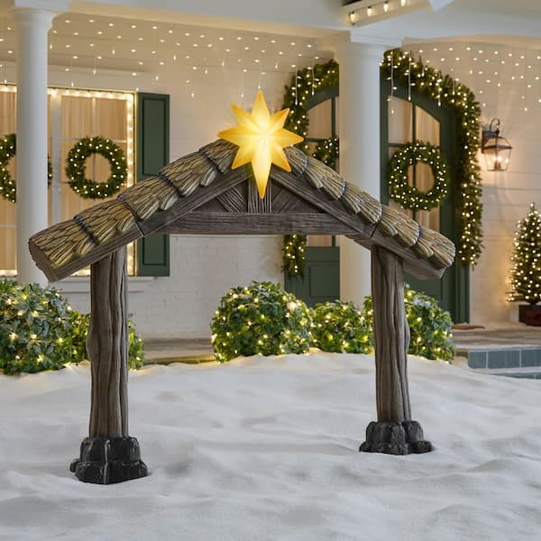 Rustic Nativity Stable Scene in a Snowy Yard — Christmas House Exterior Decor