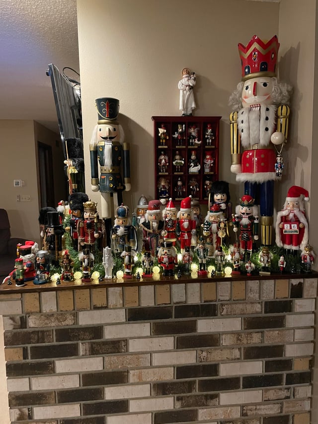 Layered Nutcracker Collection on Fireplace Mantel — Nutcracker Display