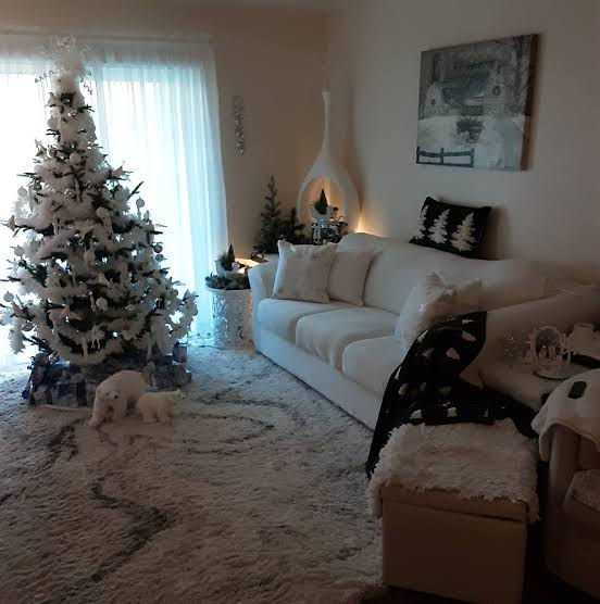 Prominent White Christmas Tree in Modern Space — Christmas Apartment Decor