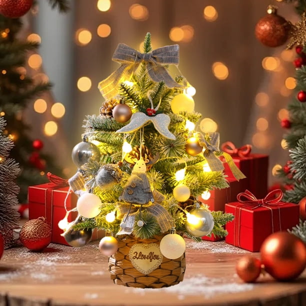 Traditional Miniature Christmas tree with white and gold ornaments on a tabletop Traditional Miniature Christmas tree with white and gold ornaments on a tabletop — Gold and White Christmas Tree