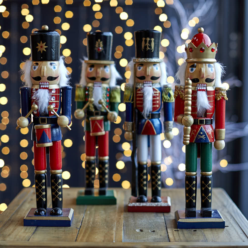 Detailed Nutcrackers on a Wooden Surface — Nutcracker Christmas Decor