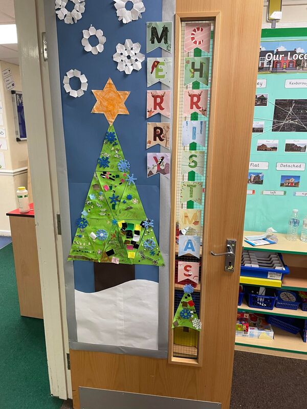 Handmade Paper Snowflakes and Christmas Tree Door — Christmas Classroom Decor