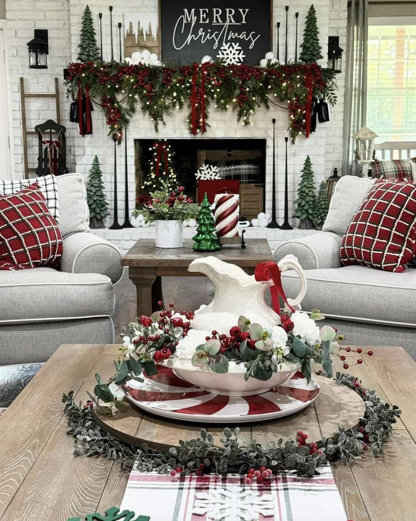 Symmetrical Farmhouse Living Room with Fireplace and Garland Symmetrical Farmhouse Living Room with Fireplace and Garland — Farmhouse Christmas Decor