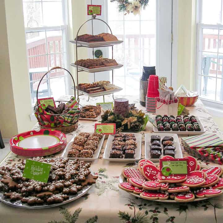 Abundant Christmas Dessert Spread on a Holiday Tablecloth Abundant Christmas Dessert Spread on a Holiday Tablecloth — Christmas Dessert Table