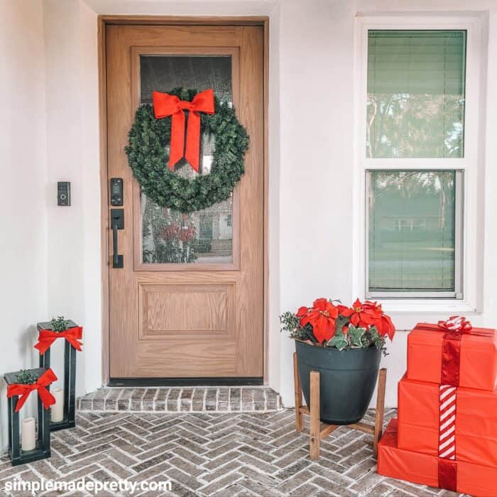 Modern Natural Wood Door with Large Evergreen Wreath Modern Natural Wood Door with Large Evergreen Wreath — Small Christmas Porch