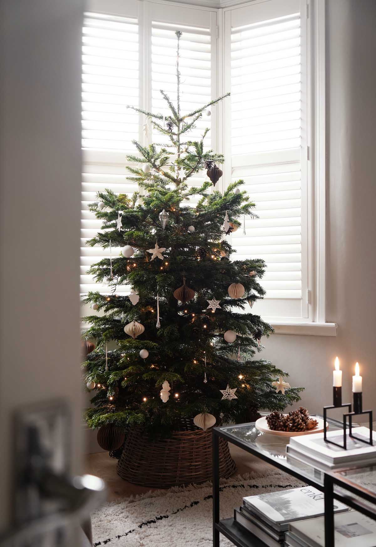 Minimalist Tree with Natural Ornaments by a Window — Small Christmas Tree Decor
