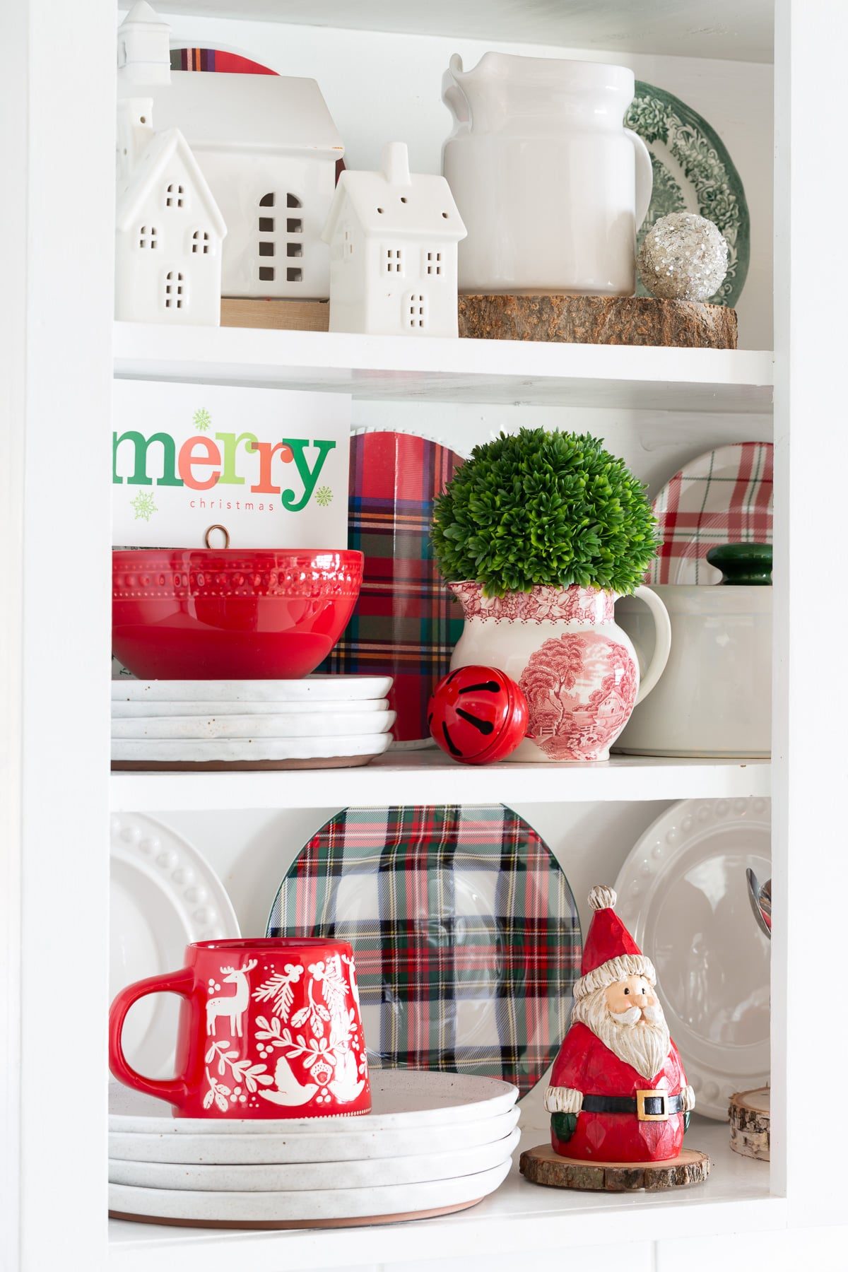 Farmhouse Shelves Styled with White Ceramic Houses and Plaid Pitcher Farmhouse Shelves Styled with White Ceramic Houses and Plaid Pitcher — Christmas Kitchen Decor