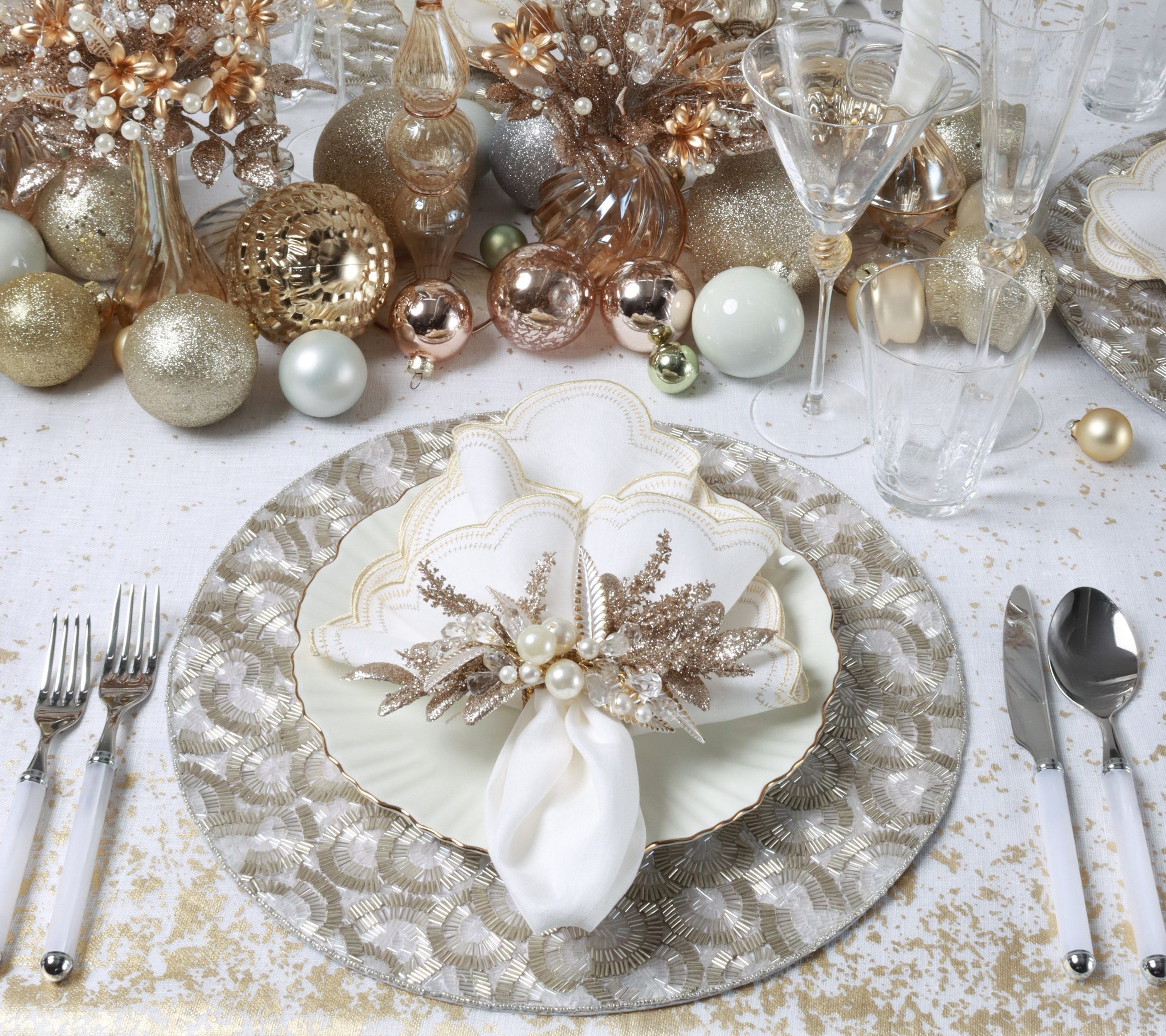 Opulent Gold Placemats and Pearl Embellishments for a Luxury Place Setting Opulent Gold Placemats and Pearl Embellishments for a Luxury Place Setting — Elegant Christmas Table Setting