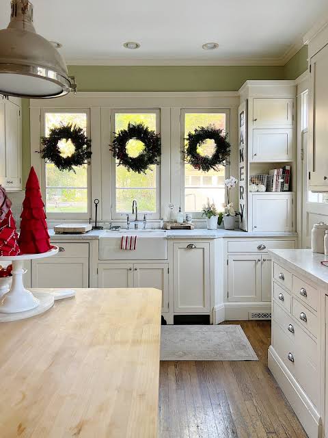 Farmhouse Kitchen Windows Decorated with Large Christmas Wreaths — Farmhouse Christmas Kitchen