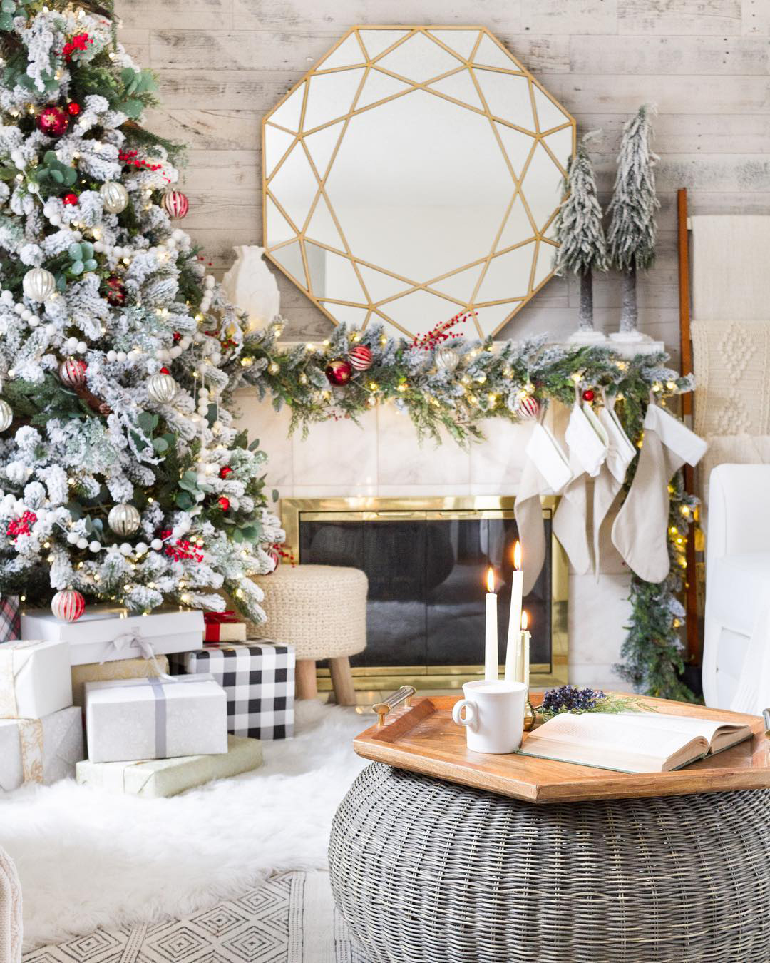 Modern Living Room with Flocked Tree and Geometric Mirror Above Fireplace — Modern Christmas Decor