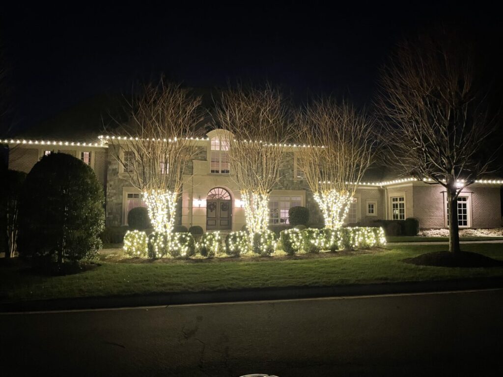 Traditional Stone House Extensively Decorated with White Lights Traditional Stone House Extensively Decorated with White Lights — Outdoor Christmas Lights