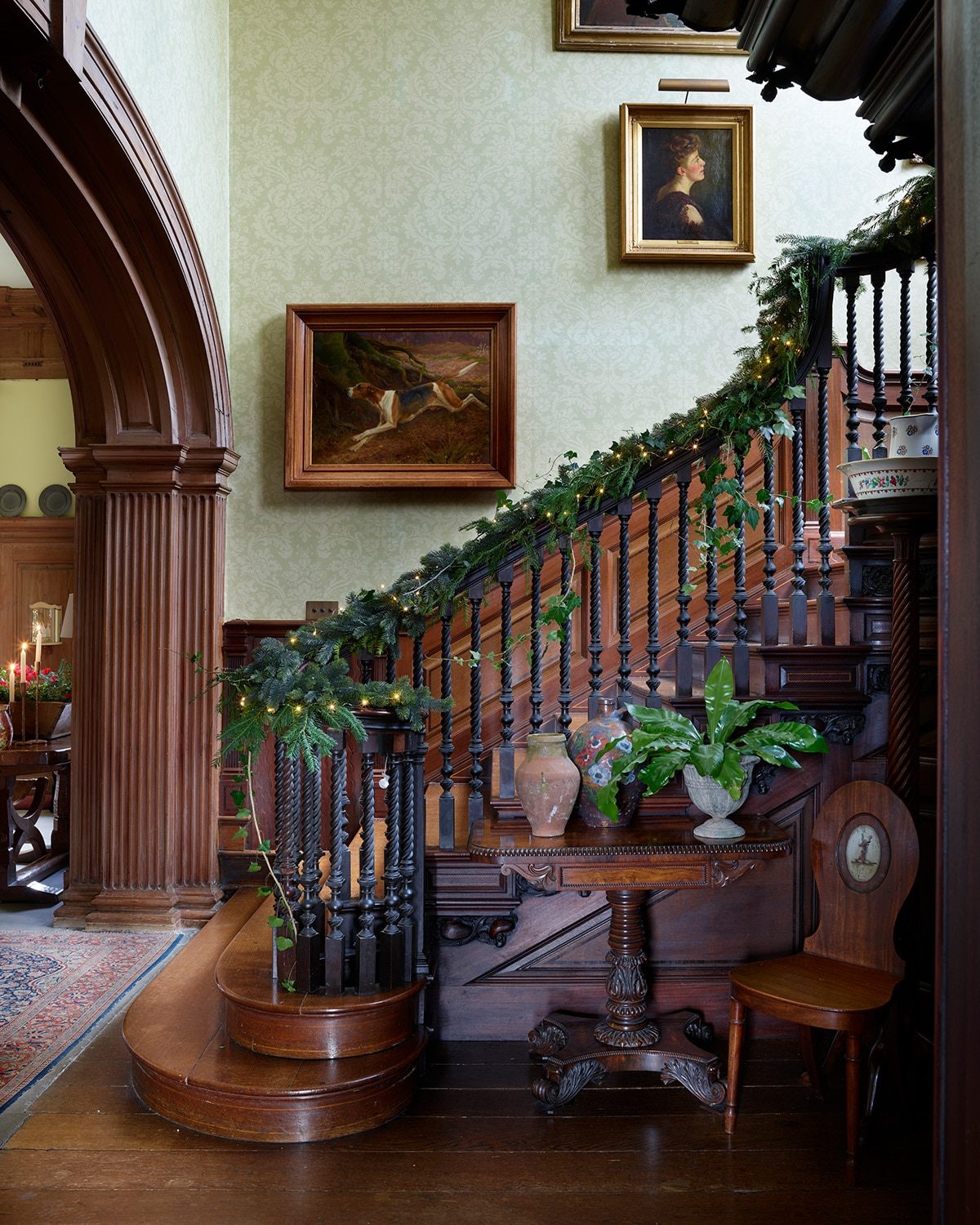 Victorian Staircase with Subtle Greenery and Antique Accents Victorian Staircase with Subtle Greenery and Antique Accents — Christmas Staircase Decor