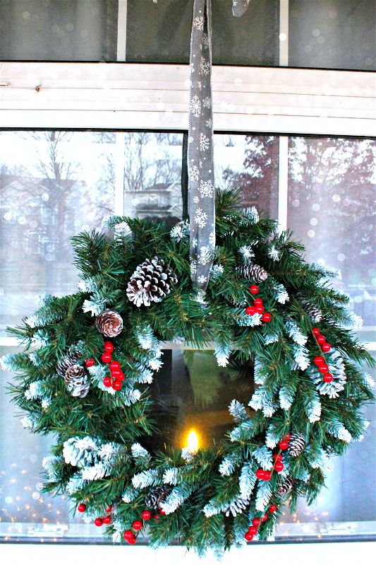 Frosted Pine Wreath with Snowflake Ribbon on an Outdoor Window — Christmas Window Decor Outdoor