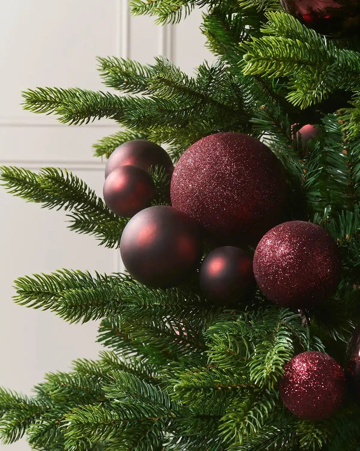 Collection of Burgundy Christmas Baubles with Varied Finishes Collection of Burgundy Christmas Baubles with Varied Finishes — Burgundy Christmas Decor