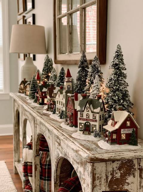 Farmhouse Village Along a Distressed Console Table — Christmas Village Display