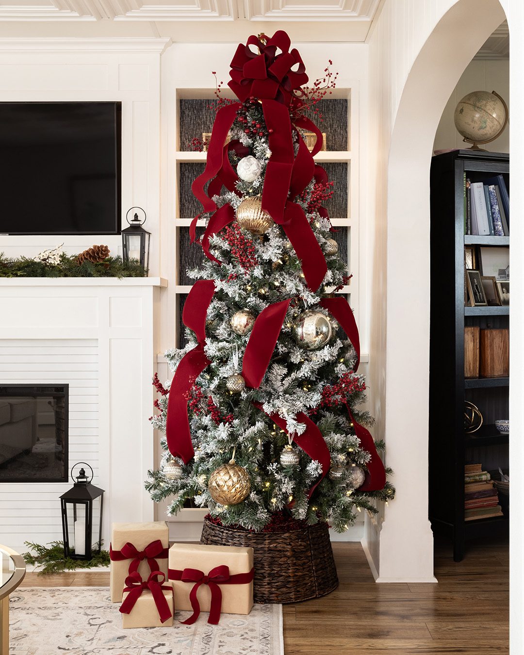 Flocked Tree with Dramatic Red Velvet Ribbon Bows — Vertical Ribbon Christmas Tree