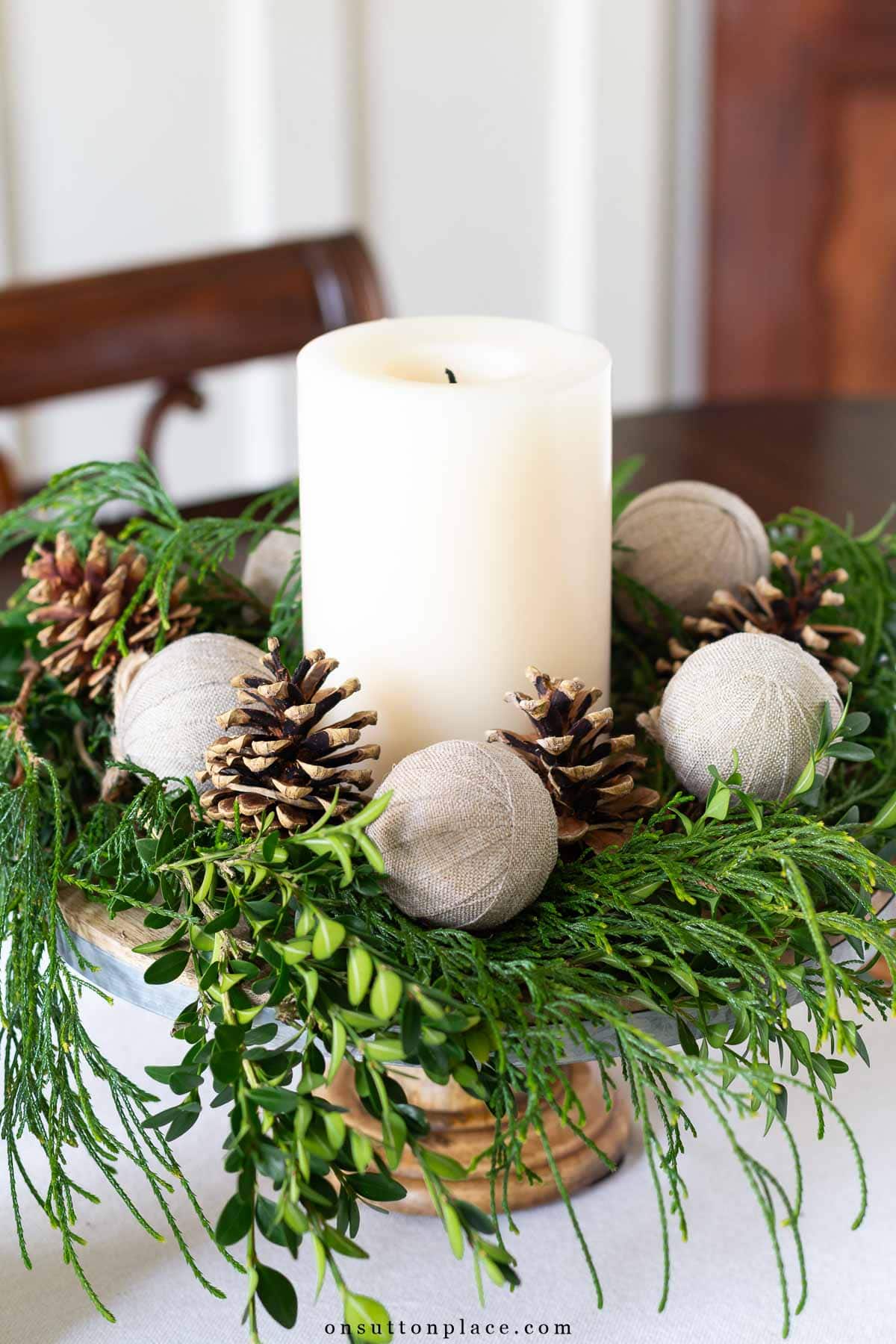 Rustic Pillar Candle and Greenery Centerpiece in Metal Bowl Rustic Pillar Candle and Greenery Centerpiece in Metal Bowl — Simple Christmas Centerpiece